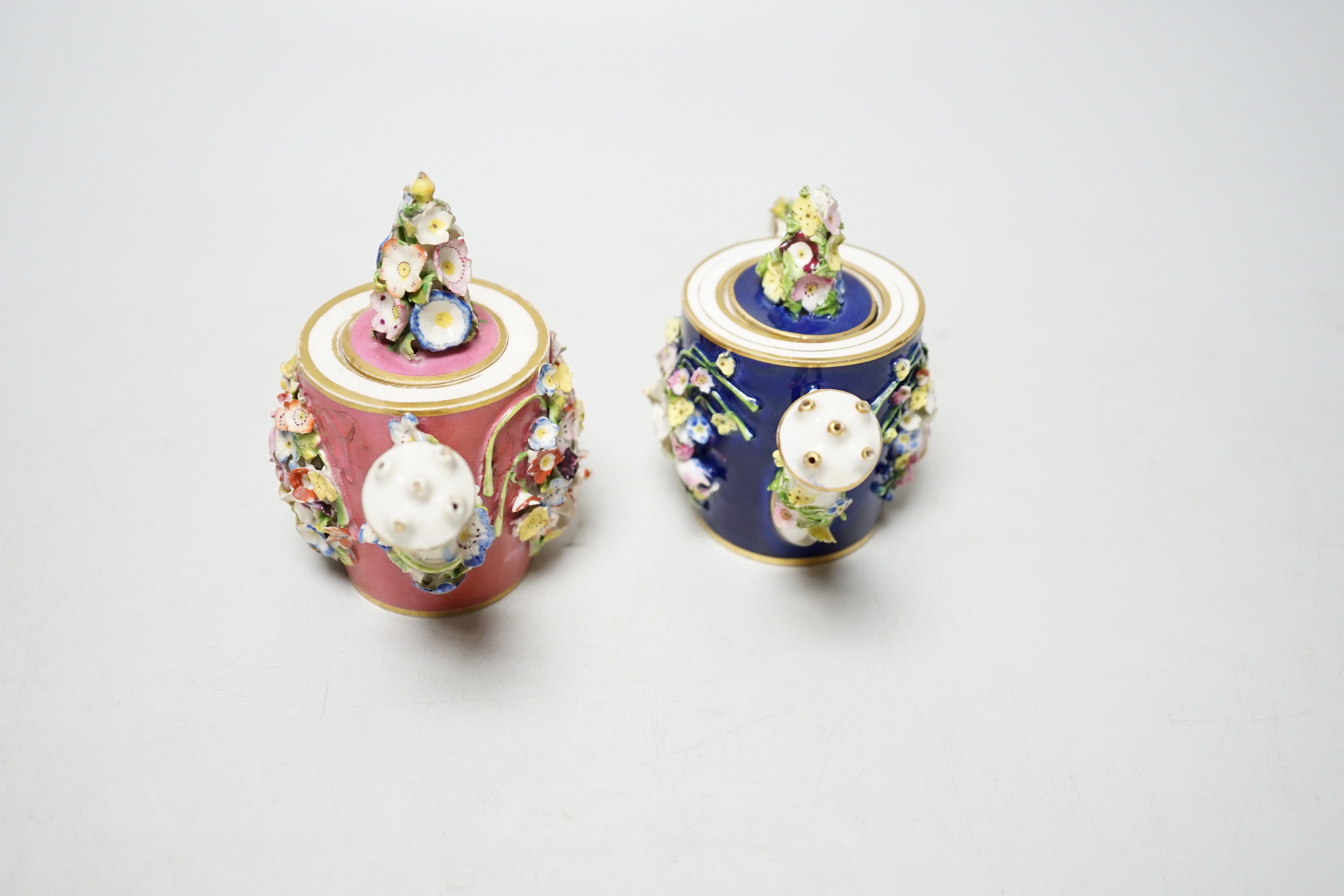 Two Derby porcelain floral encrusted miniature water sprinklers, circa 1825, tallest 10cm